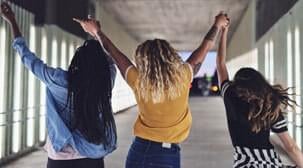 Trafficking survivors holding hands